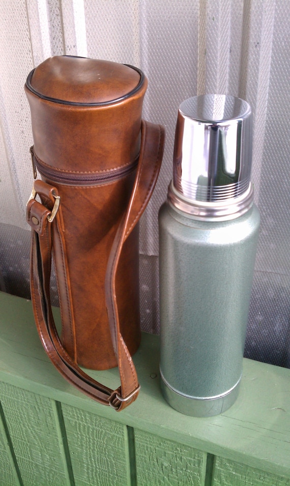 Stainless steel Stanley Aladdin thermos with faux leather case