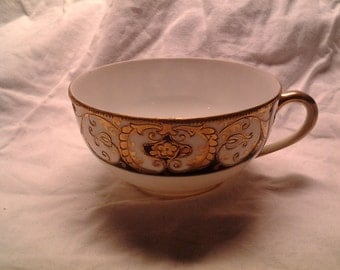 Noritake Teacup, Hand Painted with Gold on Black and White