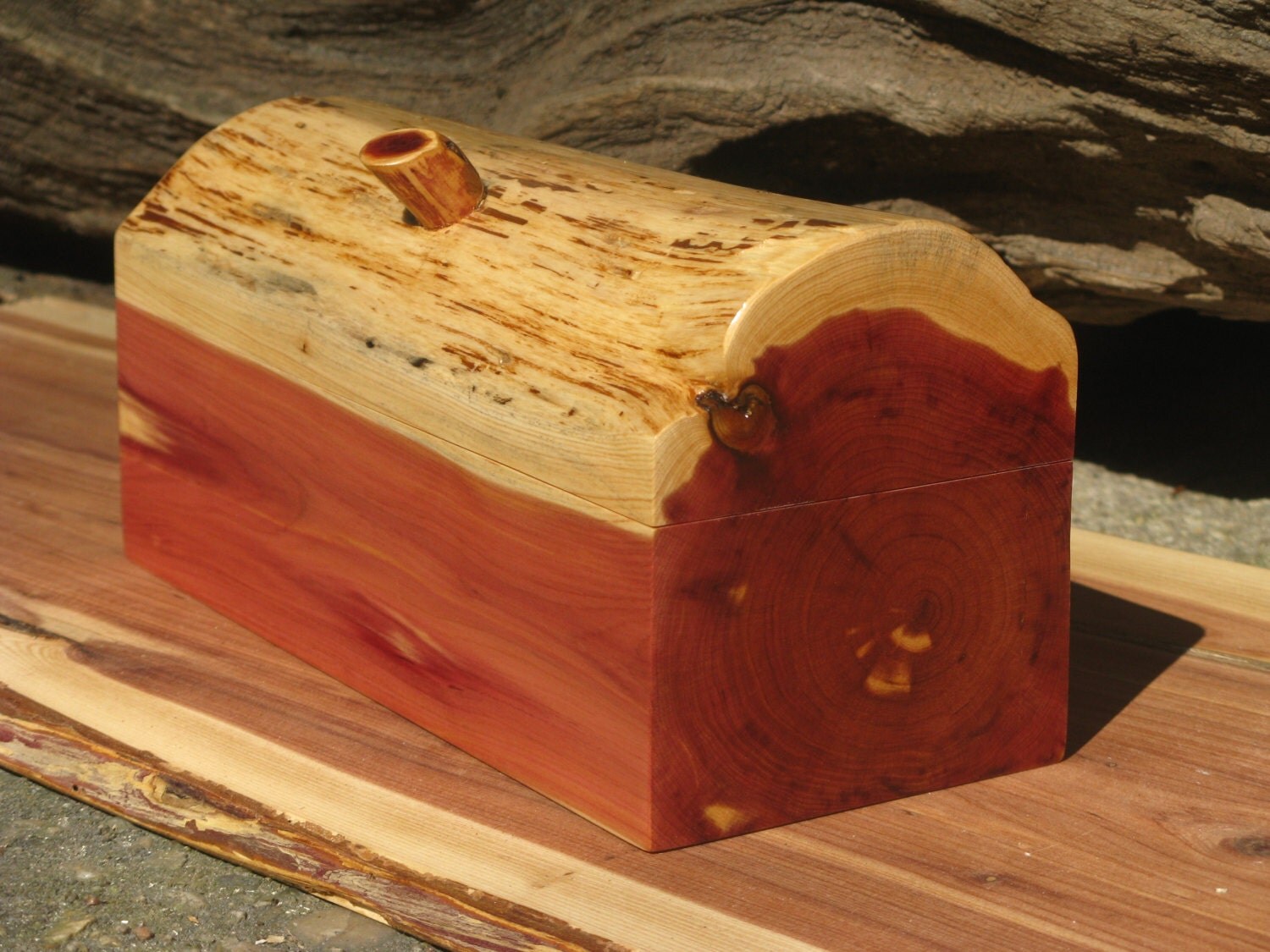 Aromatic eastern red cedar log box with twig pull