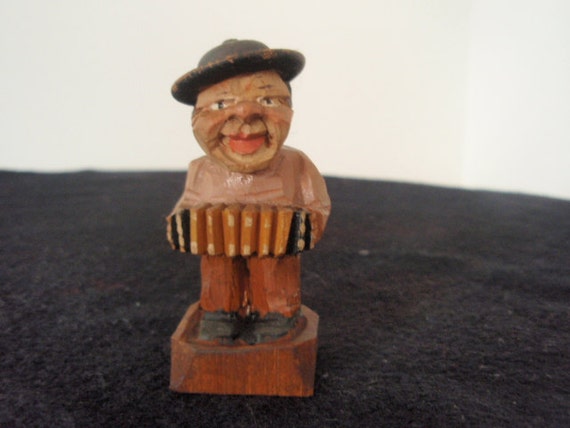 Vintage Wood Statue of Man playing by SocialmarysTreasures on Etsy