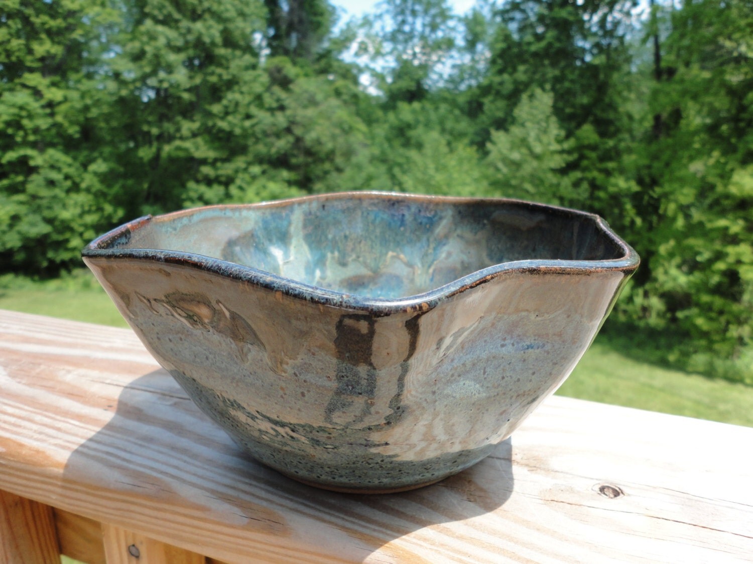 Odd shaped blue ceramic serving bowl.