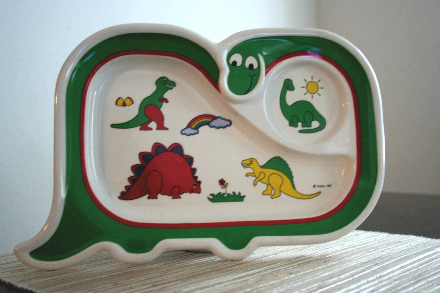 dinosaur plate on head