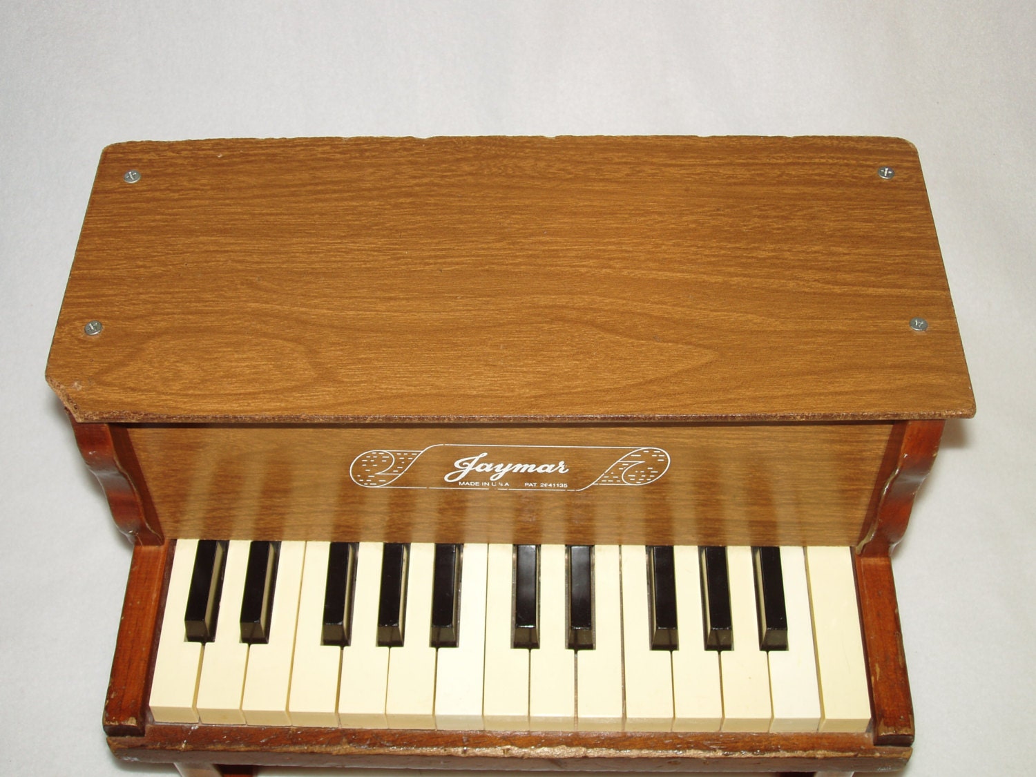 vintage wooden toy piano