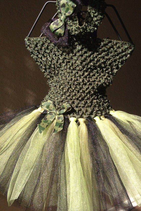 Camo baby tutu dress with matching headband. Fits 624mth.