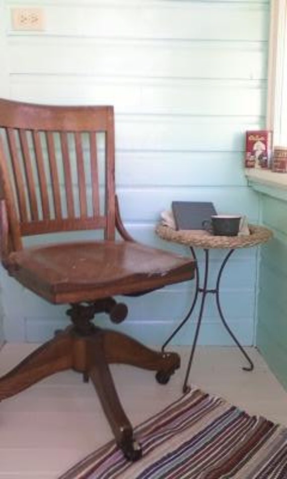 Antique oak desk chair. Colonial Chair Co. Chicago logo on