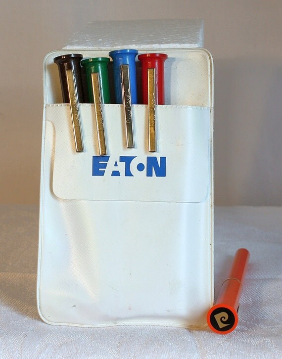 Eaton Corp plastic pocket protector with 5 Piere Cardin ball