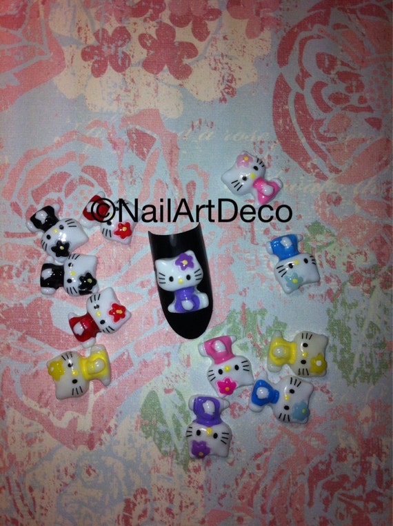 Items similar to 3d nail art accessories hello kitty 12pc on Etsy