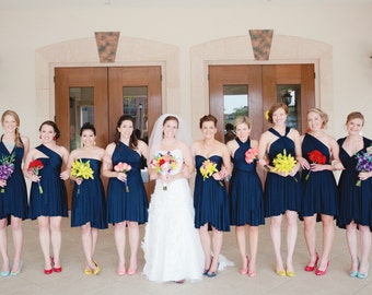 Navy blue bridesmaid dresses with orange flowers