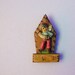 Vintage carved wood key hook. little boy playing piano accordion statuette. rustic key rack