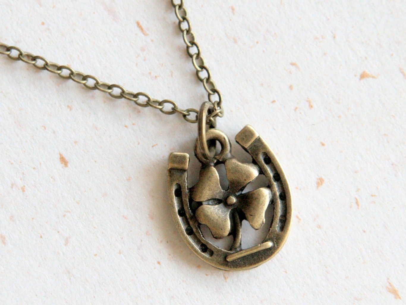 Horseshoe Necklace N328 with lucky clover in vintage brass