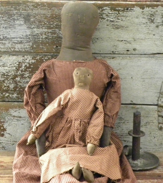 Items similar to Primitive Early Farmhouse Doll with dolly on Etsy