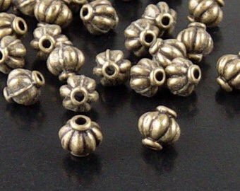 Bead Spacer 50 Antique Bronze Corrugated Round 6mm x 5.4mm NF (1060spa06z1)