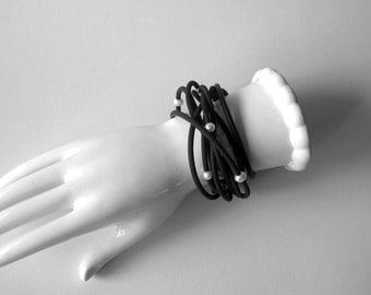 trendy pearl bangle, edgy rubber bracelet, black and white