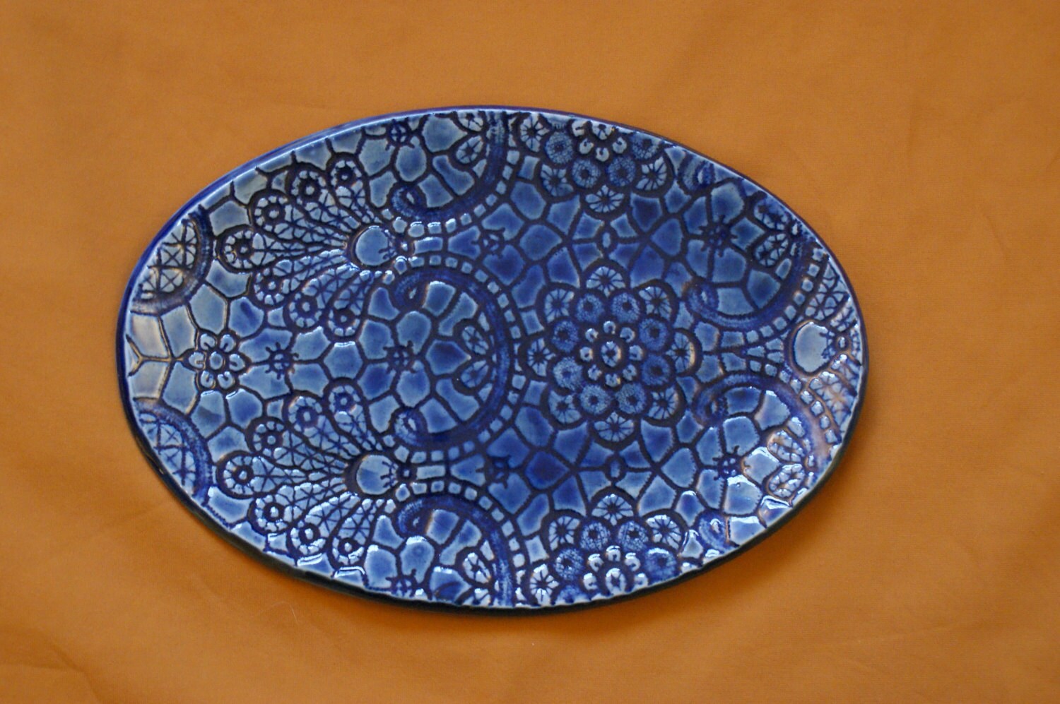 Textured blue pottery platter