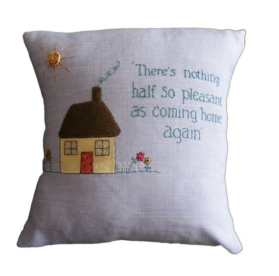 Home quote cushion pillow, applique and embroidery on lilac cotton.