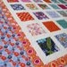 Simply TERRAIN 54x60 quilt in orange, turquoise, fuschia and purple