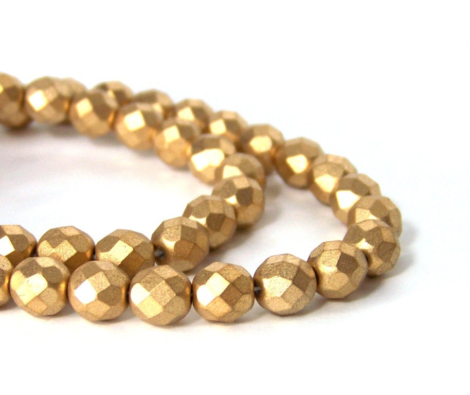 Metallic gold glass beads matte finish 8mm faceted round