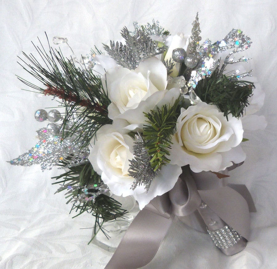 Winter wedding bouquet and boutonniere white roses silver