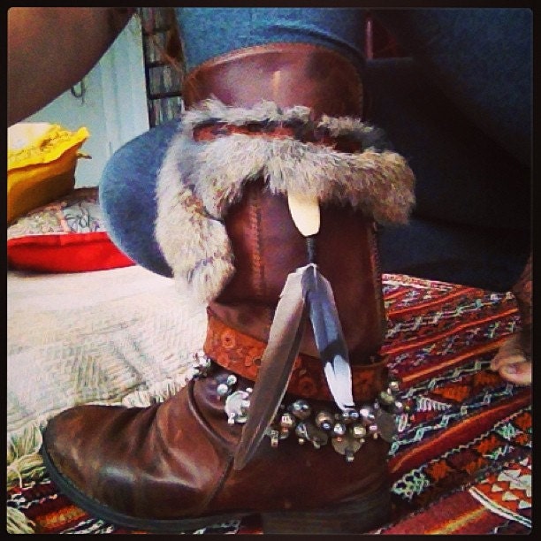 Handmade leather rabbit fur boot wrap with feathers and carved