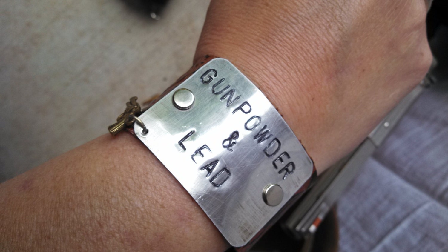 Hand Stamped Metal and Leather Cuff Bracelet And Charm.
