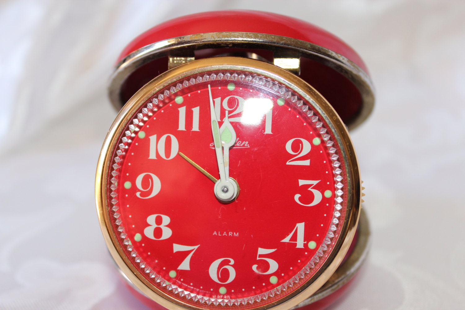 red travel alarm clock