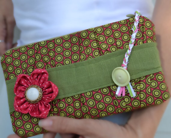 green and pink clutch bag