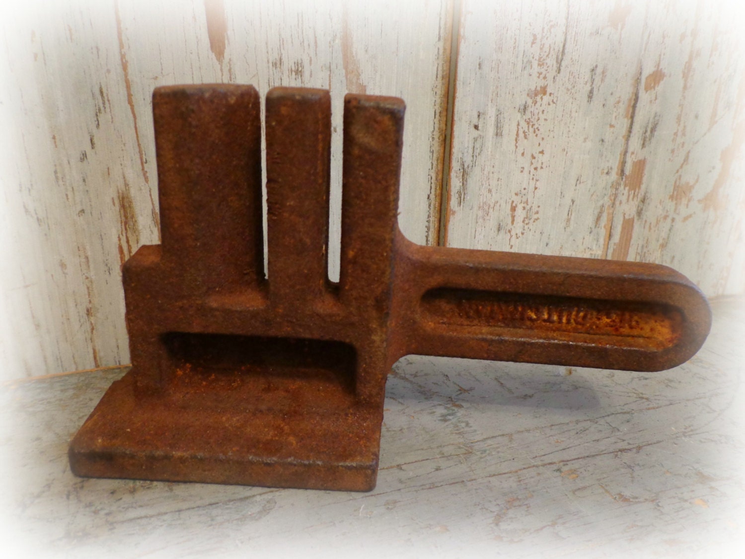 antique chain detacher / cast iron tool