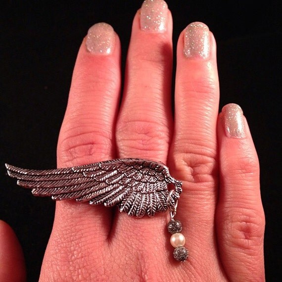 Items similar to Angel Wing Ring on Etsy