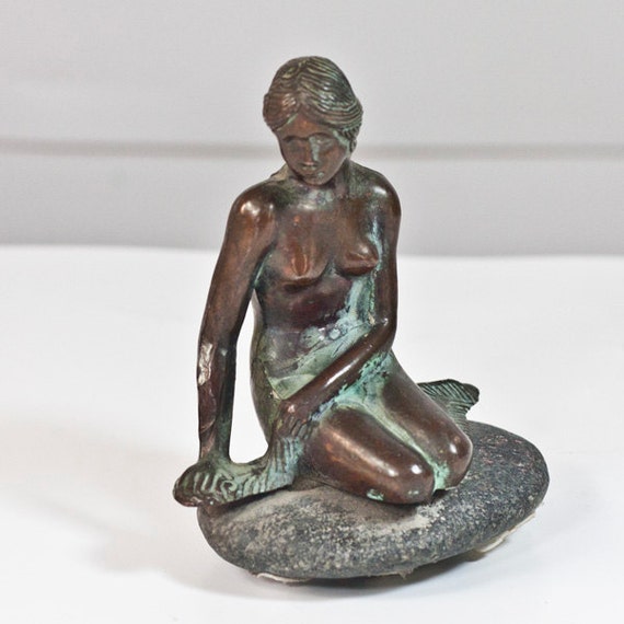 bronze mermaid figurine