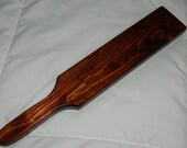 Pine adult spanking paddle.