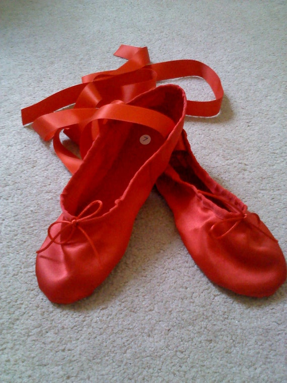 red ballet slippers with ribbons