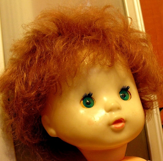 vintage doll with blinking eyes