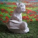 concrete sheltie dog statue