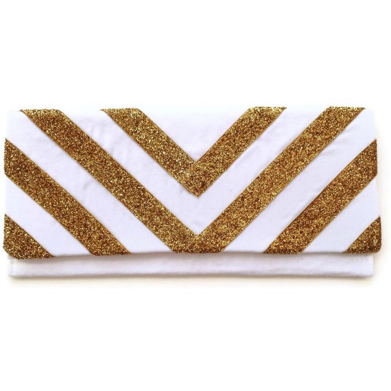 The Glitter Chevron clutch in gold and white