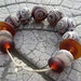 SALE Reduced by 25% Etched Lampwork Beads by Cherie Sra R114 RUINS Translucent Lampwork Beads
