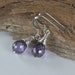 Amethyst Cubic Zirconia and Sterling Silver Earrings.