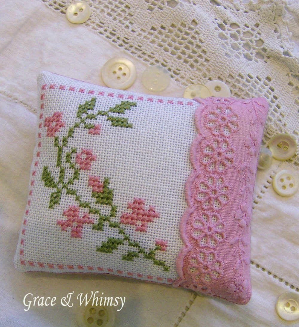 Floral cross stitch pincushion