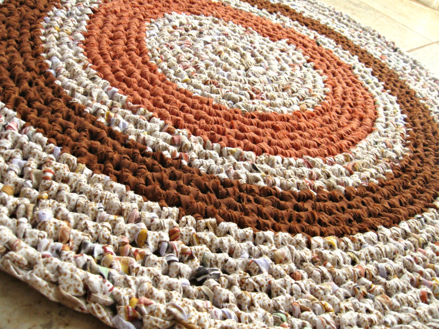 Eco reused recycle. Handmade crochet rag rug in spicy shades