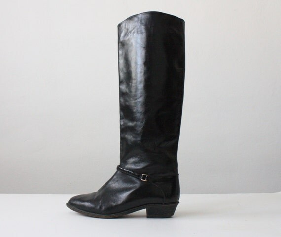 Items similar to vintage black leather buckle boots size 6 on Etsy