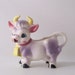 vintage purple cow figurine