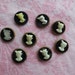 Vintage small cameo design gold tone metal edge plastic shank buttons. Wholesale lot of 8.