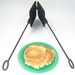 Antique cast iron pizzelle iron, maker of old-fashioned gourmet Italian waffle cookies. Vintage square baking press and Norwegian recipe.