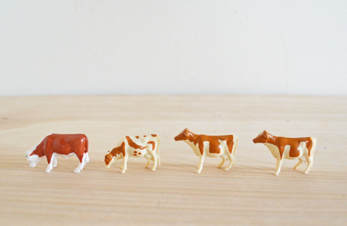 SUMMER SALE Four Vintage Plastic Cow Toy Figurines Brown White
