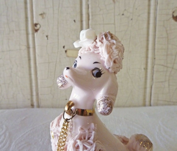 pink spaghetti poodle figurine