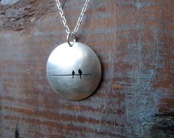 reversible 2 birds on a wire silver dome necklace