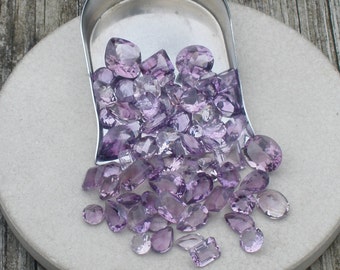 over 50 carats of loose natural amethyst gem mix