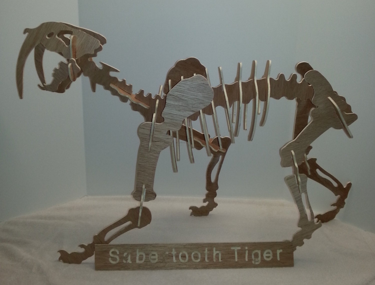 saber toothed dragon dinosaur