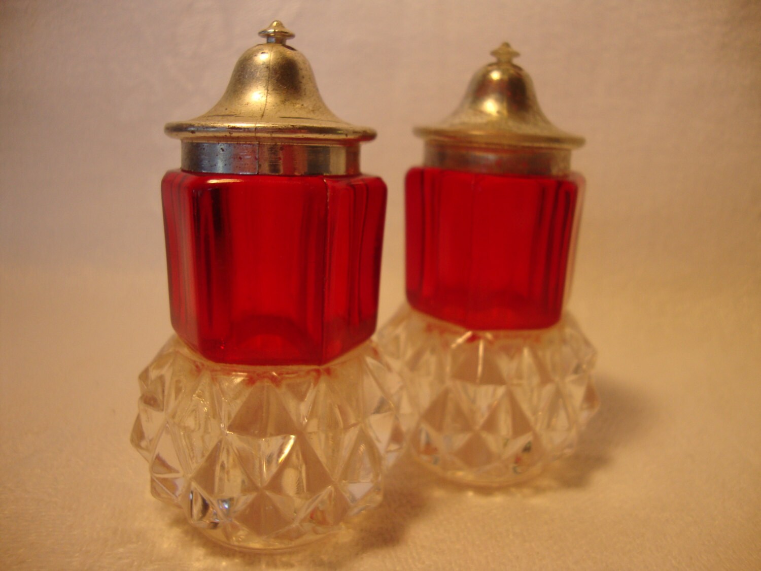 Salt and pepper shakers vintage red plastic diamond point