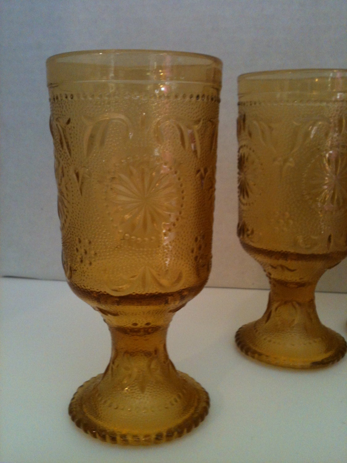 Vintage amber glass anchor hocking stemmed glasses from Duz
