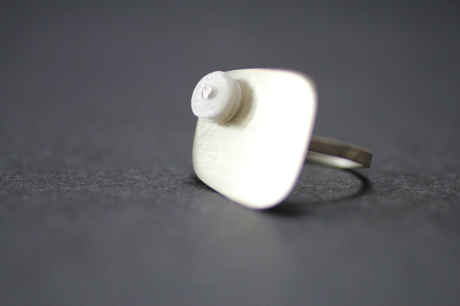 Recycled Sterling Silver and Milk Jug Ring by twicecreations
